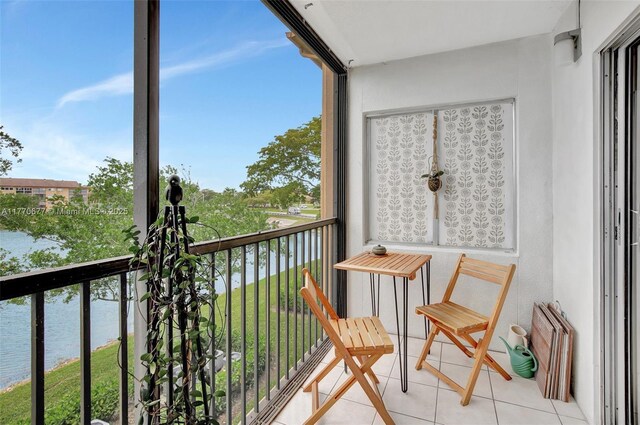 13701 SW 12th St Unit 310A, Pembroke Pines, FL 33027 - balcony featuring a water view and radiator
