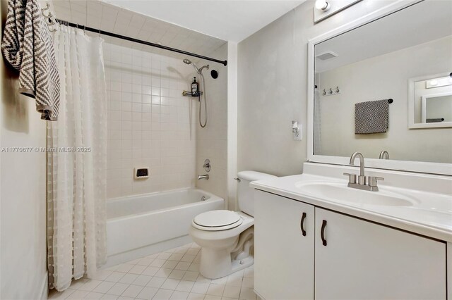 13701 SW 12th St Unit 310A, Pembroke Pines, FL 33027 - bathroom with shower / tub combo, toilet, vanity, and tile patterned floors