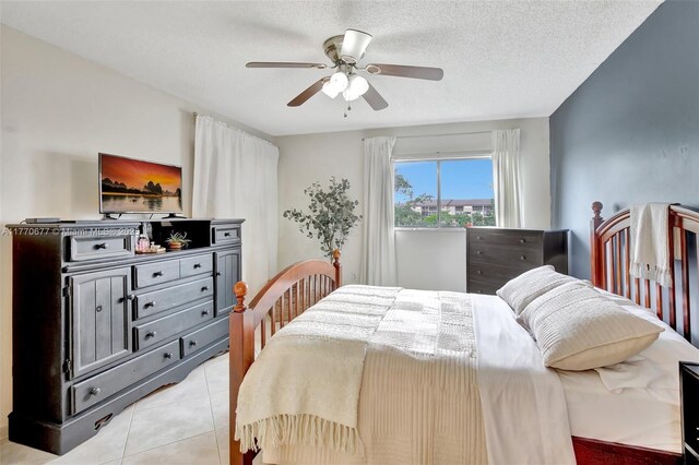 13701 SW 12th St Unit 310A, Pembroke Pines, FL 33027 - bedroom with light tile patterned flooring and ceiling fan