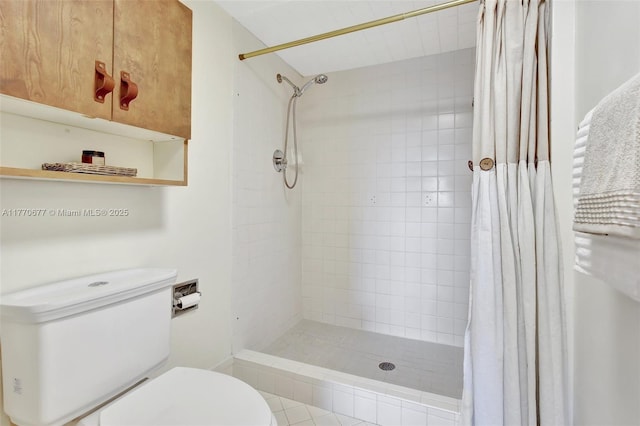 13701 SW 12th St Unit 310A, Pembroke Pines, FL 33027 - full bathroom featuring toilet and tiled shower