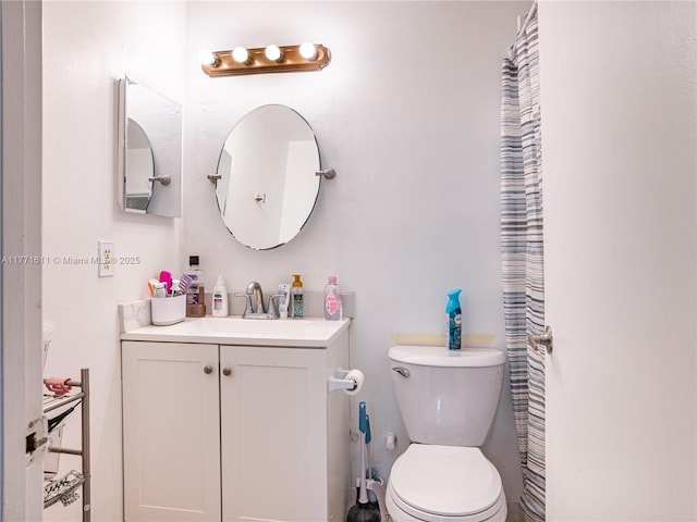 6545 W 27th Ct Unit 24-47, Hialeah, FL 33016 - bathroom featuring toilet and vanity