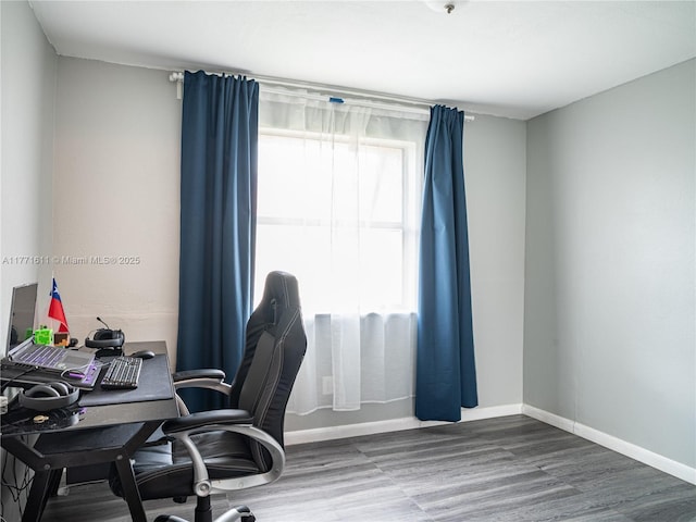 6545 W 27th Ct Unit 24-47, Hialeah, FL 33016 - office area featuring wood finished floors and baseboards