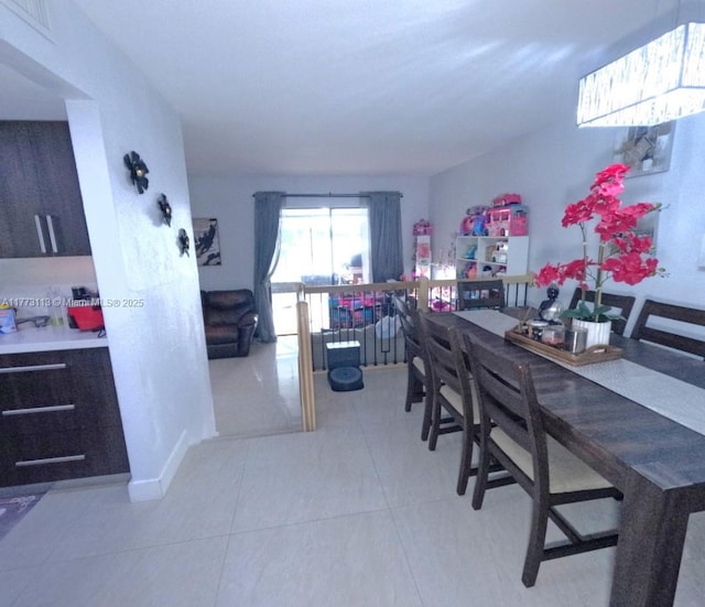 8920 Palm Tree Ln Unit 8920, Pembroke Pines, FL 33024 - dining area featuring light tile patterned floors