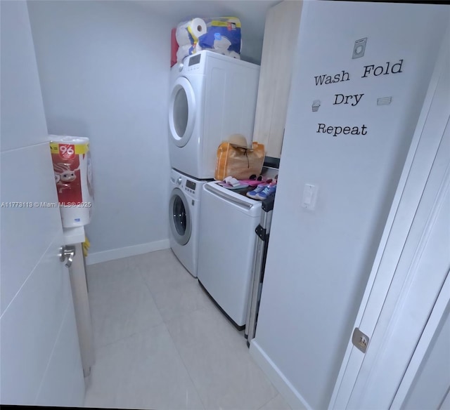 8920 Palm Tree Ln Unit 8920, Pembroke Pines, FL 33024 - washroom with estacked washer and dryer and light tile patterned floors