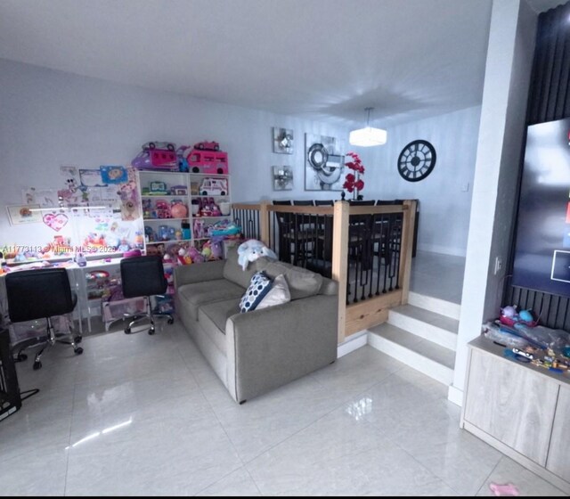 8920 Palm Tree Ln Unit 8920, Pembroke Pines, FL 33024 - living room with a desk and tile patterned flooring