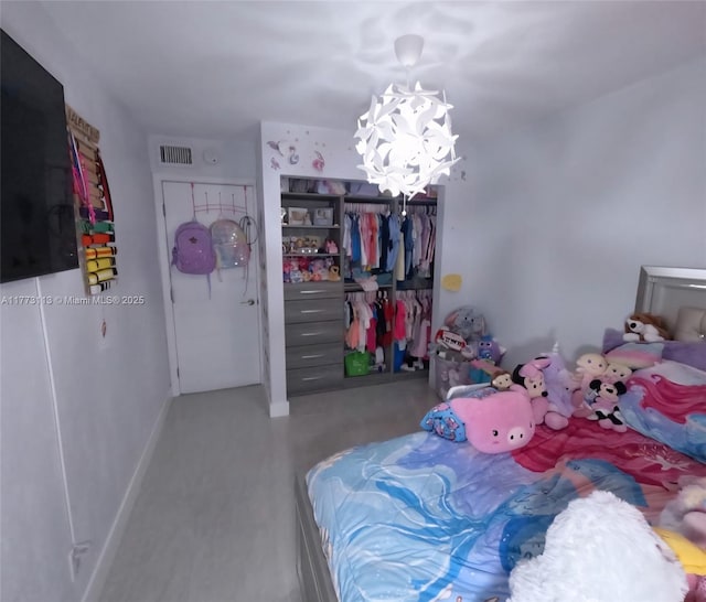 8920 Palm Tree Ln Unit 8920, Pembroke Pines, FL 33024 - bedroom with a closet and a chandelier