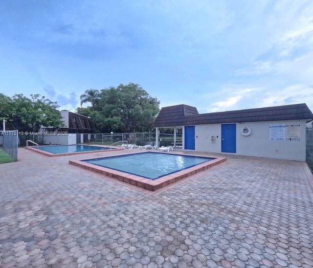 8920 Palm Tree Ln Unit 8920, Pembroke Pines, FL 33024 - community pool with a patio