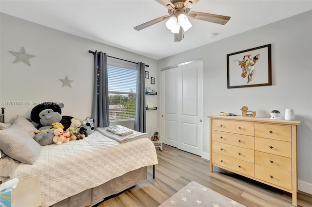 709 SW 17th St, Fort Lauderdale, FL 33315 - bedroom with a ceiling fan, a closet, light wood-type flooring, and baseboards