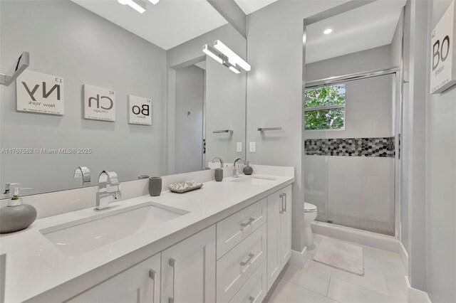 709 SW 17th St, Fort Lauderdale, FL 33315 - full bathroom with a sink, double vanity, and a stall shower