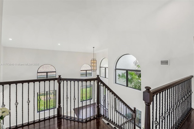 20160 NW 9th Dr, Pembroke Pines, FL 33029 - corridor with an upstairs landing, dark wood-style floors, a high ceiling, a chandelier, and recessed lighting