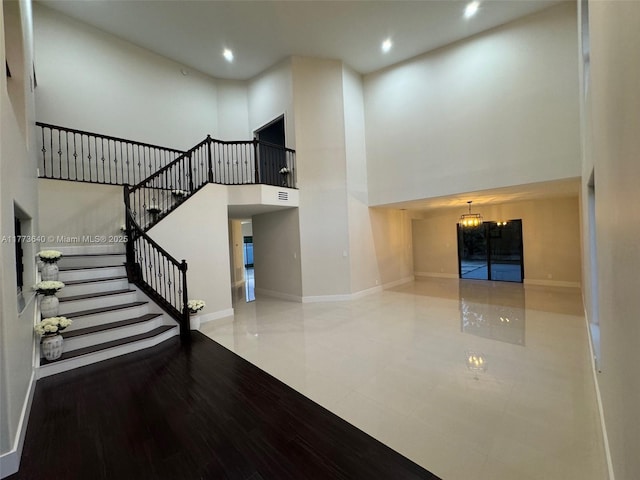 20160 NW 9th Dr, Pembroke Pines, FL 33029 - entrance foyer with a chandelier, a high ceiling, stairway, and recessed lighting