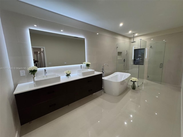 20160 NW 9th Dr, Pembroke Pines, FL 33029 - bathroom with a stall shower, tile patterned flooring, a freestanding tub, double vanity, and recessed lighting