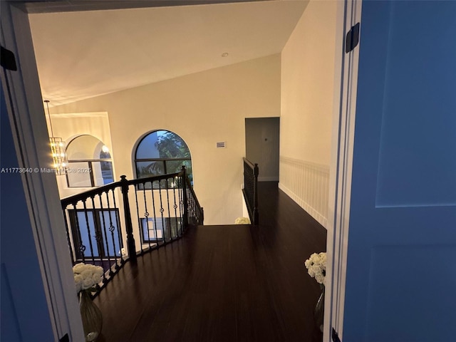 20160 NW 9th Dr, Pembroke Pines, FL 33029 - hallway featuring wood finished floors, a chandelier, and an upstairs landing