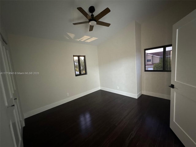 20160 NW 9th Dr, Pembroke Pines, FL 33029 - empty room with a ceiling fan and dark wood-style flooring