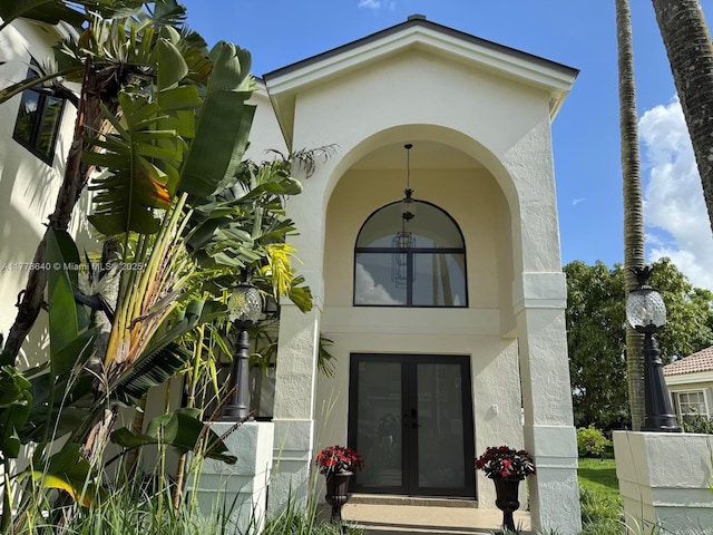 20160 NW 9th Dr, Pembroke Pines, FL 33029 - property entrance with stucco siding and french doors