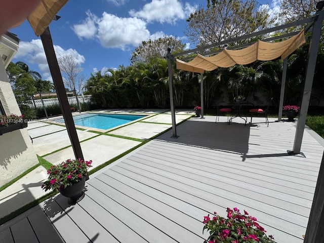 20160 NW 9th Dr, Pembroke Pines, FL 33029 - view of pool with a pergola, a wooden deck, a fenced backyard, and a patio