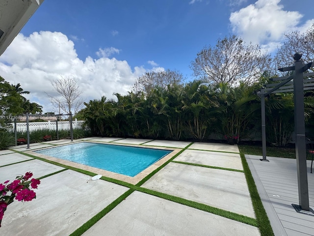 20160 NW 9th Dr, Pembroke Pines, FL 33029 - view of swimming pool with a fenced backyard and a patio