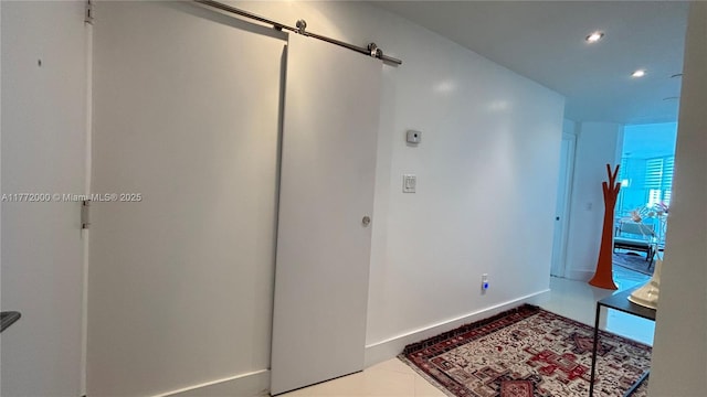 3131 NE 188th St Unit 2-1002, Aventura, FL 33180 - entryway with recessed lighting, a barn door, and baseboards