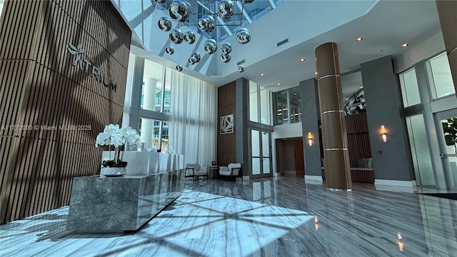 3131 NE 188th St Unit 2-1002, Aventura, FL 33180 - building lobby with a towering ceiling