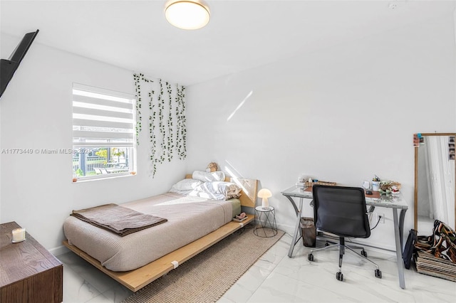 bedroom with marble finish floor