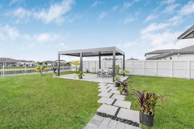 view of yard with a patio and a fenced backyard