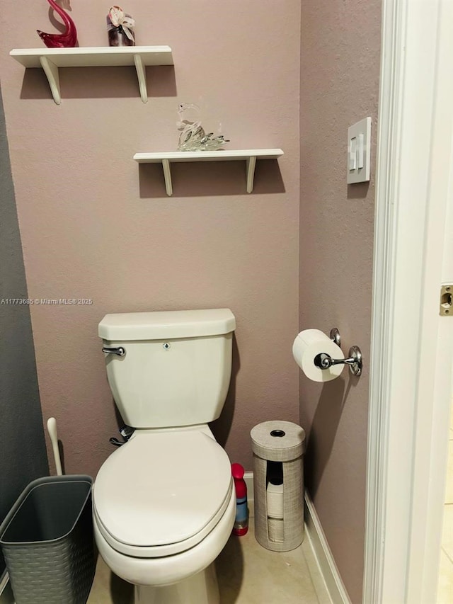 bathroom featuring toilet