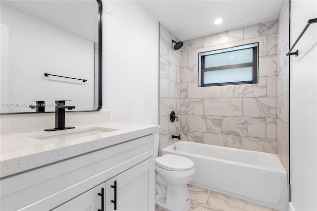 601 NW 35th Ter, Lauderhill, FL 33311 - full bath featuring vanity, washtub / shower combination, marble finish floor, toilet, and recessed lighting
