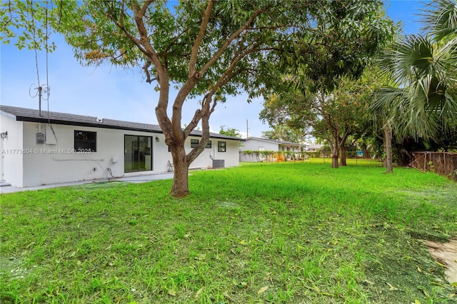 601 NW 35th Ter, Lauderhill, FL 33311 - view of yard featuring central air condition unit and fence