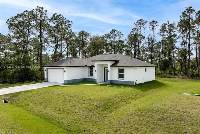 view of front of house featuring stucco siding, driveway, a garage, and a front lawn
