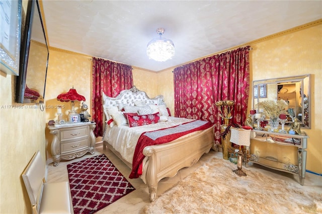 85 NW 165th St, Miami, FL 33169 - bedroom featuring ornamental molding and an inviting chandelier
