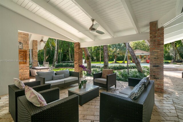 9000 Arvida Dr, Coral Gables, FL 33156 - view of patio / terrace with outdoor lounge area and a ceiling fan