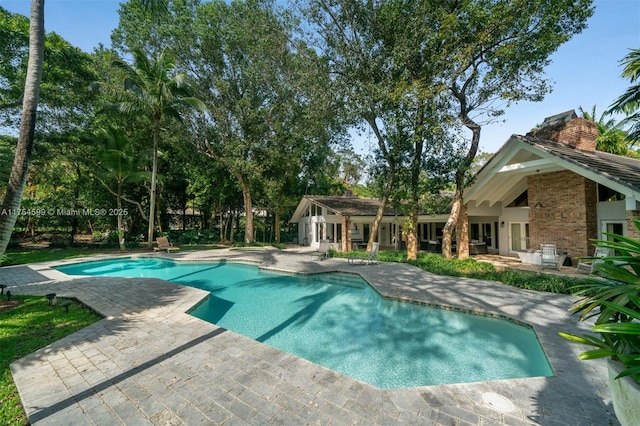 9000 Arvida Dr, Coral Gables, FL 33156 - outdoor pool with a patio