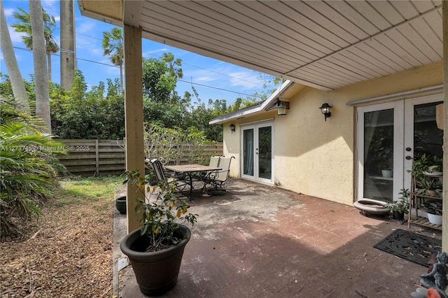 13878 SW 151st Ln, Miami, FL 33186 - view of patio with french doors and outdoor dining space