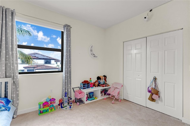 rec room featuring carpet flooring