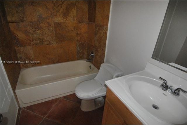bathroom featuring shower / bath combination, toilet, tile patterned flooring, and vanity