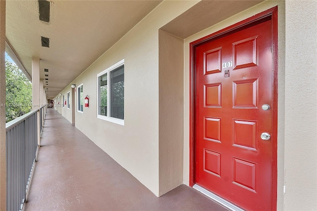 12750 SW 4th Ct Unit 407J, Pembroke Pines, FL 33027 - view of exterior entry with stucco siding