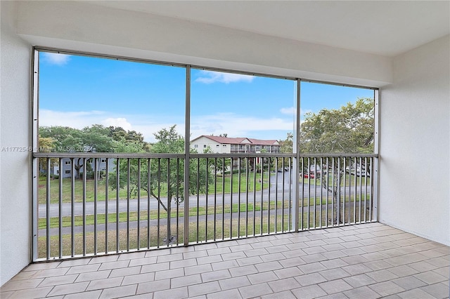 12750 SW 4th Ct Unit 407J, Pembroke Pines, FL 33027 - unfurnished sunroom featuring a residential view