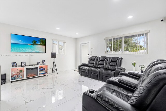 910 N 70th Ave, Hollywood, FL 33024 - living area featuring recessed lighting and light marble finish floors