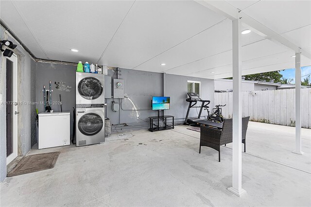 910 N 70th Ave, Hollywood, FL 33024 - basement with stacked washer and clothes dryer, refrigerator, and recessed lighting