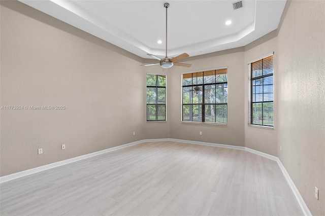 2031 SW 185th Ave, Miramar, FL 33029 - unfurnished room with a tray ceiling, light wood-style floors, ceiling fan, and recessed lighting