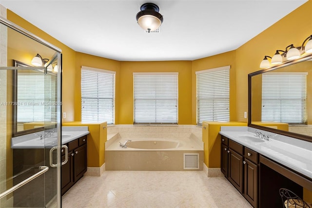 2031 SW 185th Ave, Miramar, FL 33029 - bathroom featuring vanity, a garden tub, tile patterned flooring, and a shower stall