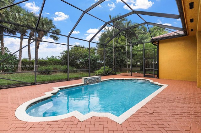 2031 SW 185th Ave, Miramar, FL 33029 - swimming pool featuring a patio and glass enclosure