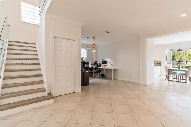 2426 Deer Creek Rd, Weston, FL 33327 - stairway with visible vents, ornamental molding, a healthy amount of sunlight, and tile patterned flooring