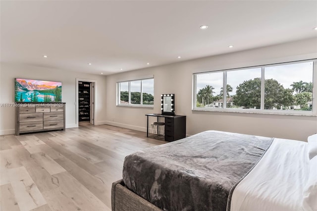 2426 Deer Creek Rd, Weston, FL 33327 - bedroom featuring recessed lighting, baseboards, and wood finished floors