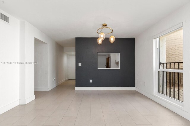 6890 N Kendall Dr Unit B202, Pinecrest, FL 33156 - unfurnished room with a chandelier and baseboards