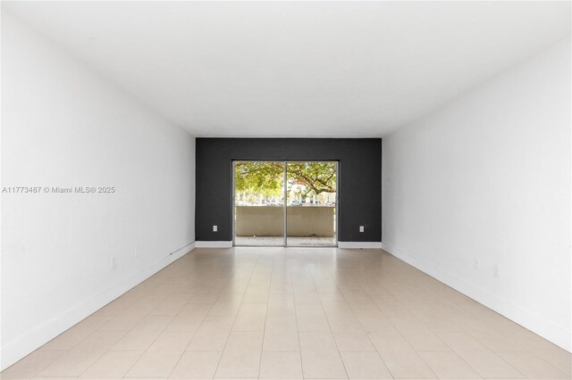 6890 N Kendall Dr Unit B202, Pinecrest, FL 33156 - unfurnished room featuring baseboards