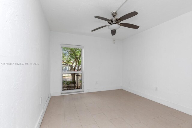 6890 N Kendall Dr Unit B202, Pinecrest, FL 33156 - unfurnished room featuring ceiling fan and baseboards