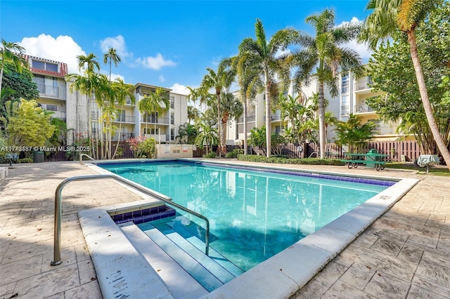 6890 N Kendall Dr Unit B202, Pinecrest, FL 33156 - community pool featuring a residential view