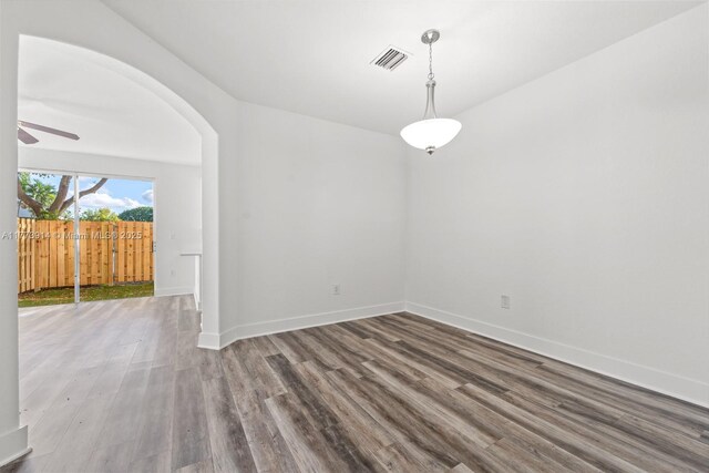 2556 SE 15th Ct, Homestead, FL 33035 - empty room with baseboards, visible vents, ceiling fan, and wood finished floors