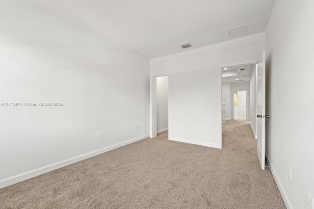 2556 SE 15th Ct, Homestead, FL 33035 - unfurnished bedroom featuring light colored carpet, visible vents, and baseboards
